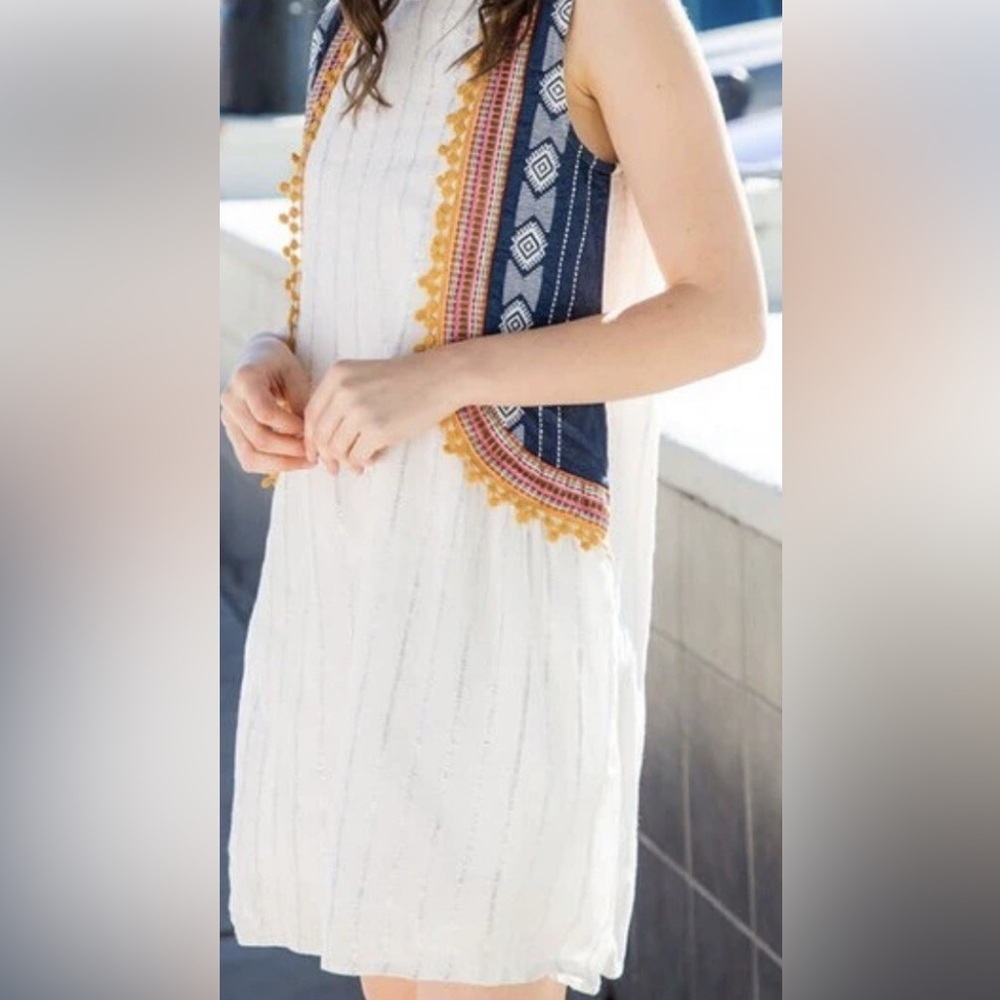 White Sleeveless Dress with Tribal Print & Embroidery Detail Size Medium. SKU 4